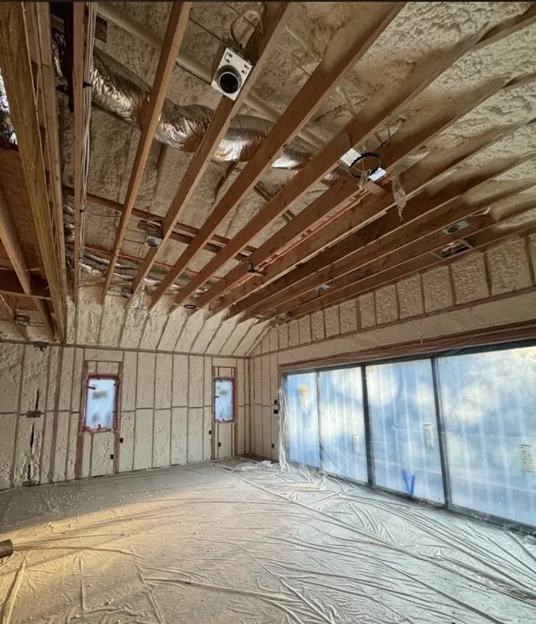 Interior walls and ceiling insulated with spray foam during new construction in Sandy Oaks